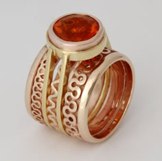 Commissioned ring in rose gold based on the Pevsner style ring with a large round Fire Opal